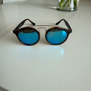 Ray-Ban Sunglasses with Blue Lenses and Brown Frame